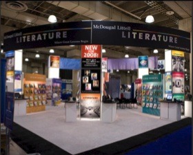 McDougal Littell literature exhibition booth with product towers, displays, and meeting space